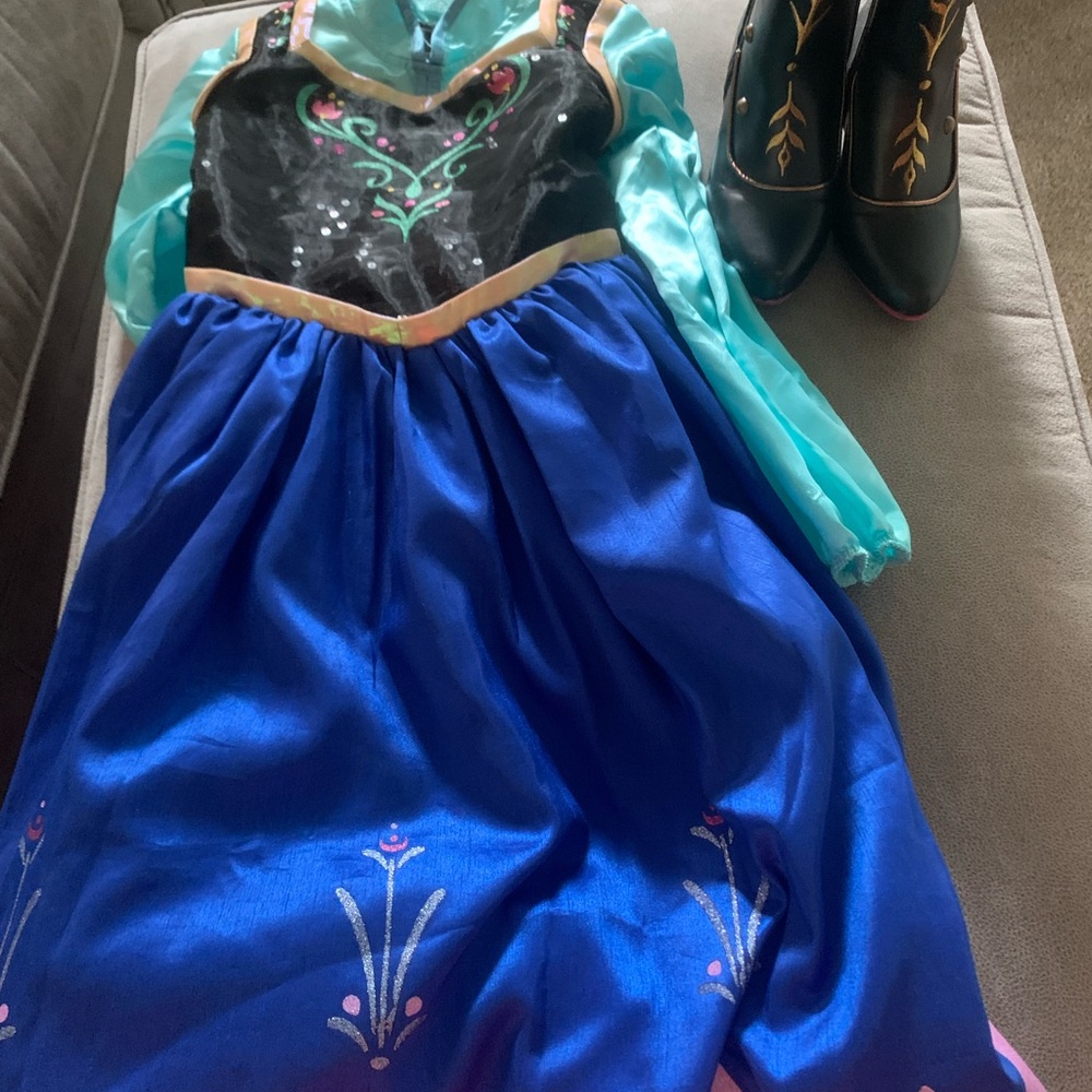 Blue and Black Halloween Costume with Nordic-Inspired Design